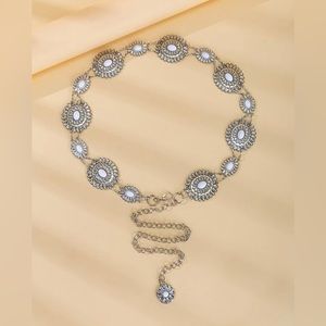 white metal flower belt